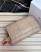 BILLETERA MEDIANA COACH EMBOSSED LOGO EDITION